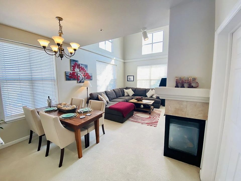 Living room / Dining space (staged; now with new hardwoods)