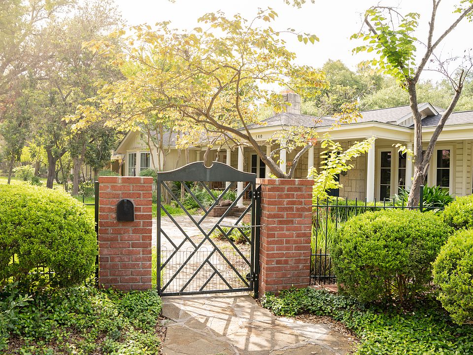 fully fenced front and back yard