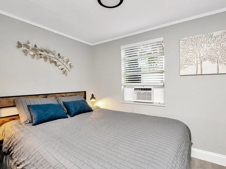 Bedroom designed to provide a calming environment for restful sleep.