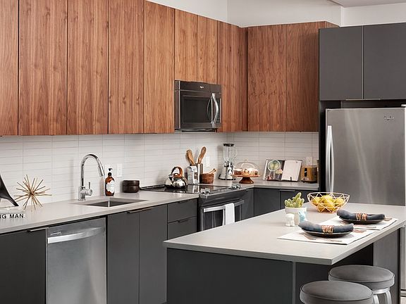 Chef-inspired kitchens enhance your entertaining skills with Caesarstone__ quartz countertops, tile backsplashes, and kitchen islands for prep work
