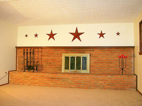 Wall to wall brick fireplace,recently inspected & cleaned,ready for new owner!