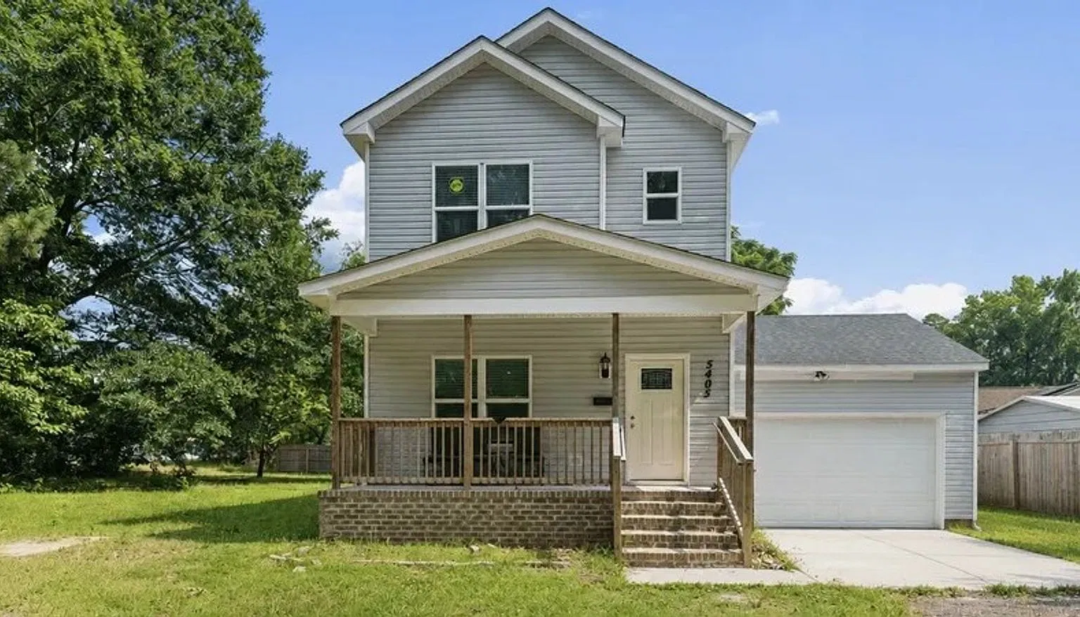 Welcome to 5405 Godwin Blvd, a beautiful newer construction home offering the perfect blend of co... — Photo 1