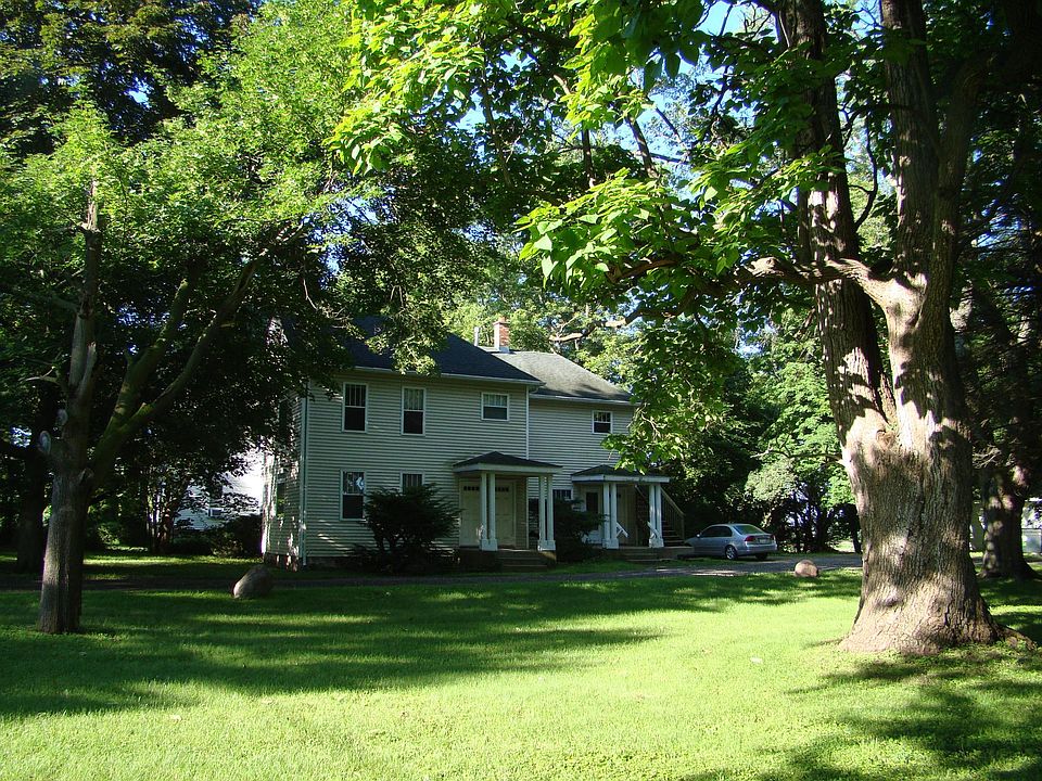 Across the large lawn. Parking close by.