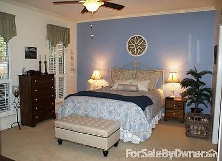 Spacious Living Room
						:
						Featuring split brick floors, vaulted ceiling, cozy fire place.