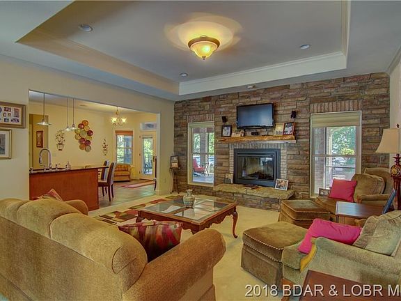 Living Room w/Native Stone and Wood Fireplace