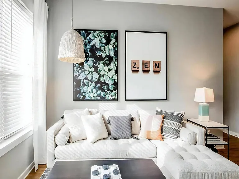 Cozy Living Room with Modern Sectional Sofa and Decorative Wall Art