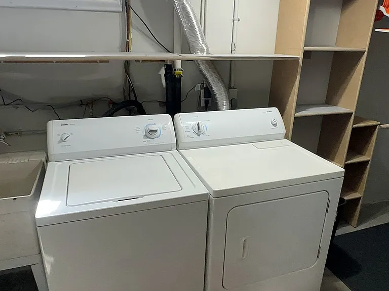 Washer and Dryer included in basement utility room