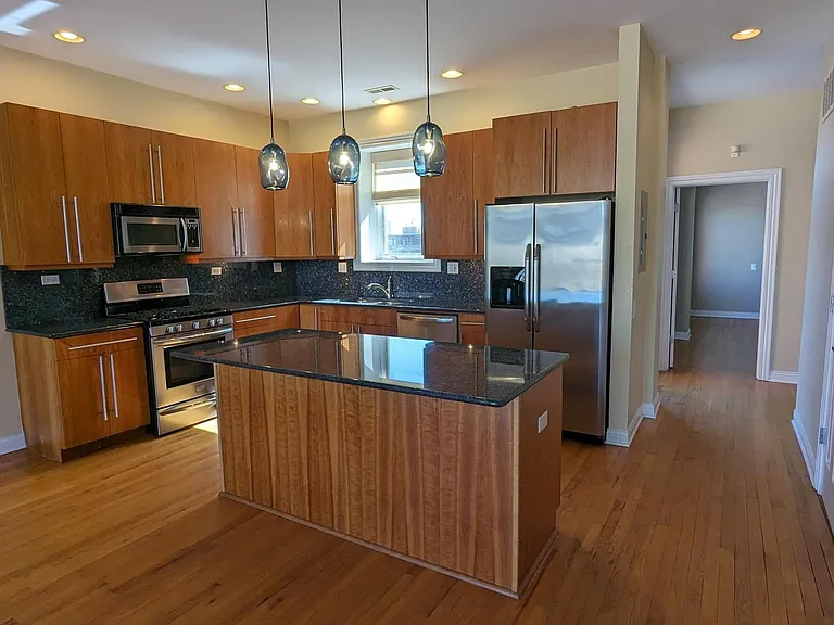 The living areas have been freshly painted in a lighter neutral tone