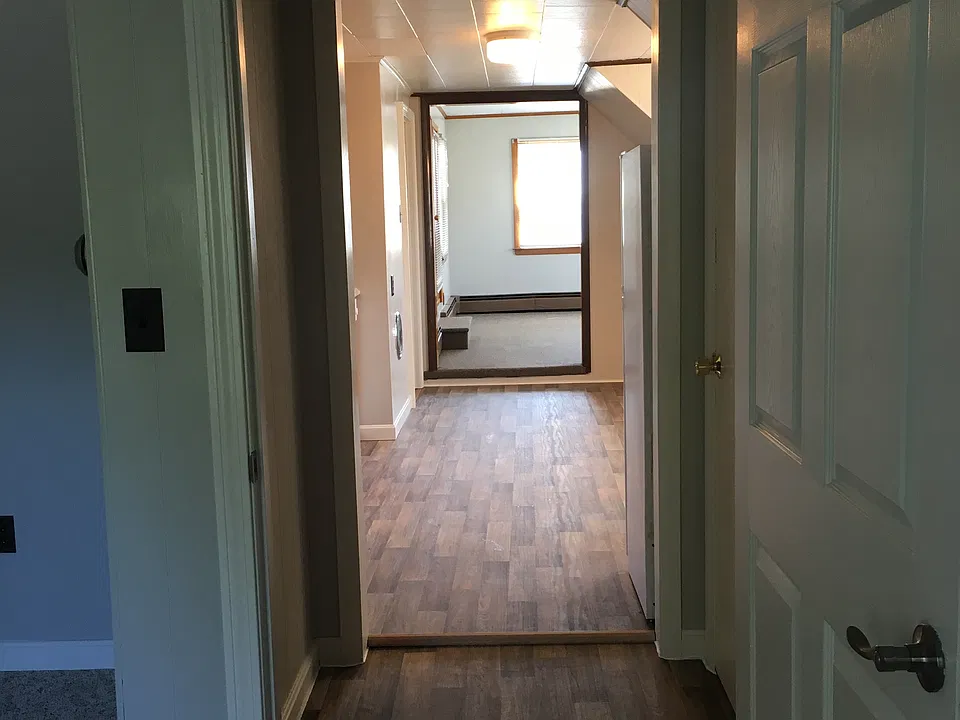 view from master, through the kitchen, to the living room