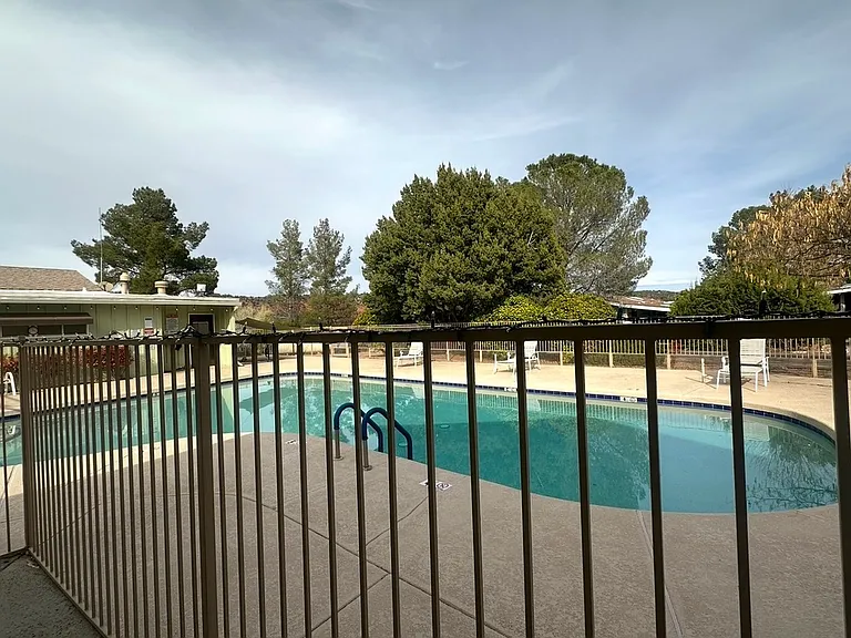 Community swimming pool & hot tub.