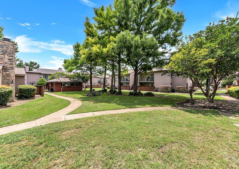 Well-maintained walking paths and lush landscaping throughout the community.