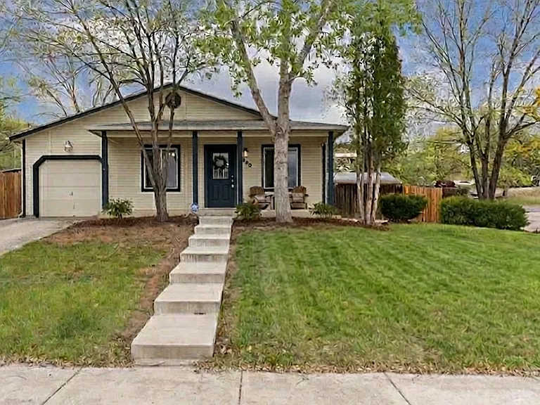 Street view from Columbine Ave. Off street parking in driveway & adjacent to the house (right side as pictured).
