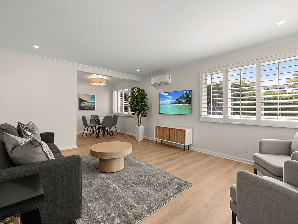 Spacious living room with lots of natural light.