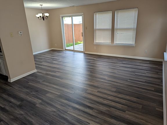 Living room is open to the dining room. All of main level has new luxury vinyl laminate.