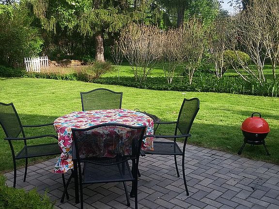 back yard adjoins a hiking path