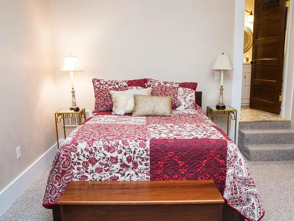 The full size bed has storage drawers underneath, located on