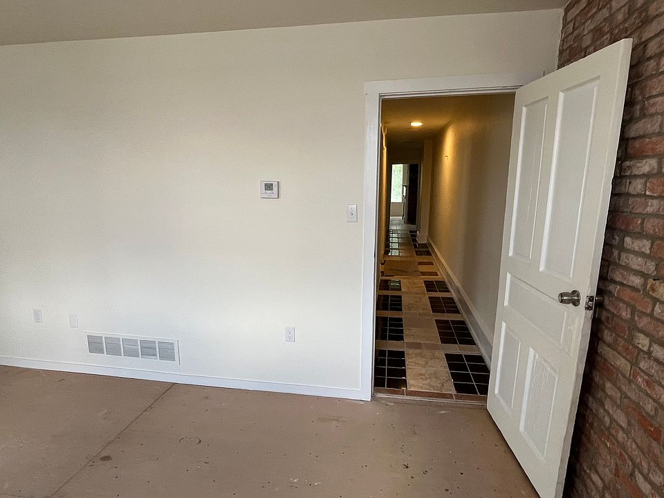 Front bedroom looking down hallway - carpet to be installed