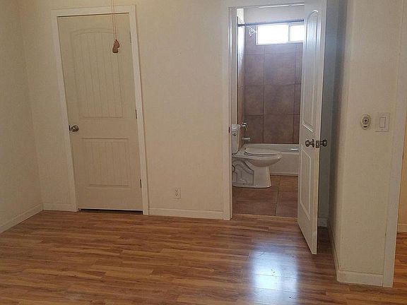 Hall way from living room. big enough to have dining table for 4 chairs by kitchen.