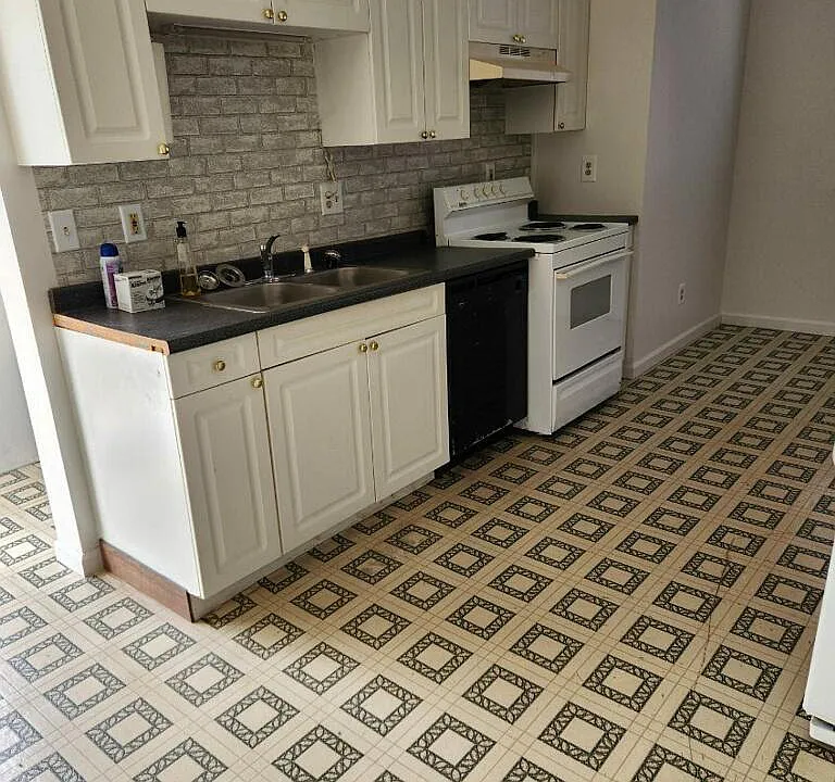 Kitchen, side entrance, extra storage space under the stairs