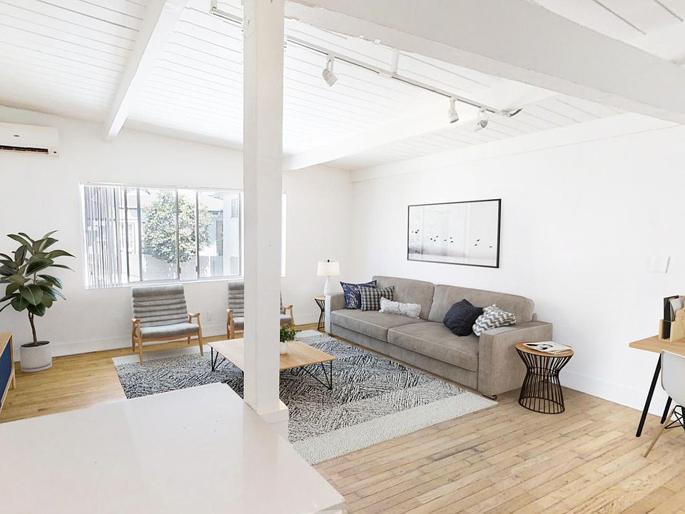 staged living room ( photos are of exact unit )