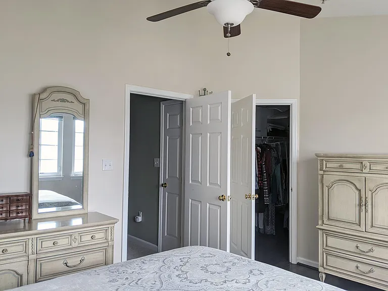 Main Bedroom - view into hallway and into walk-in closet