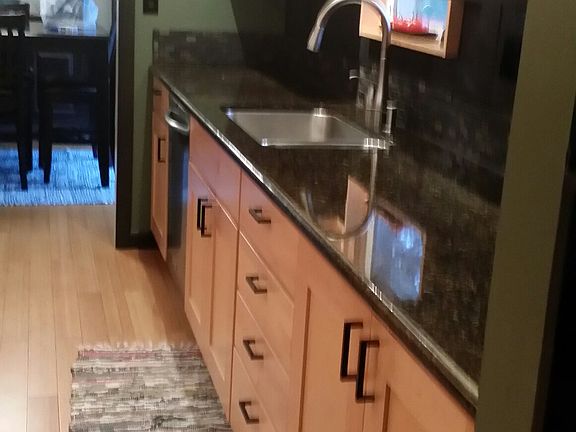 Galley kitchen w/ granite
