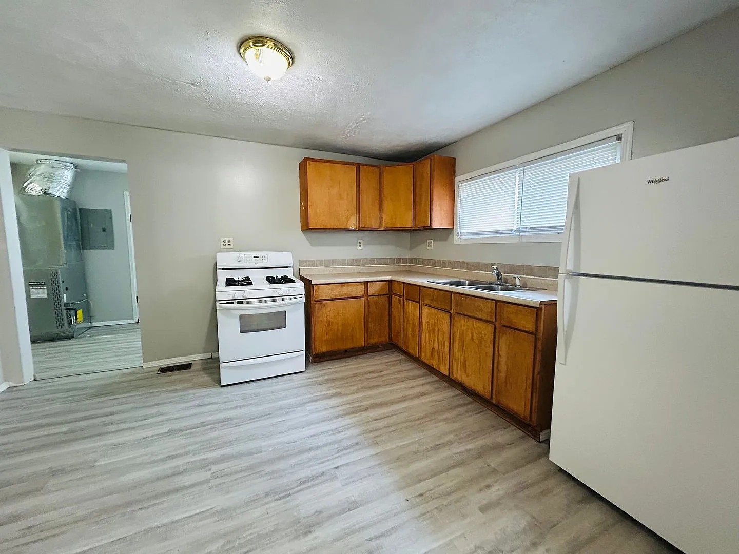 For Rent: 1213 W 17th St. 2 bedroom 1 bathroom Home! Nice porch! Nice back yard! New flooring! Wa... — Photo 1