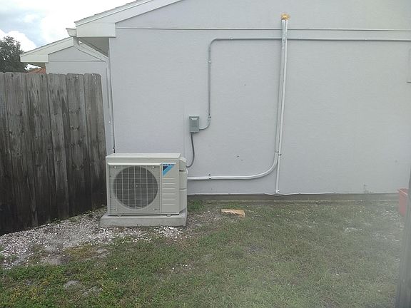 Side yard, the AC is nearly silent