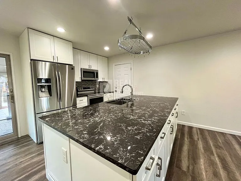 9387 W Eastman Pl — Photo 5