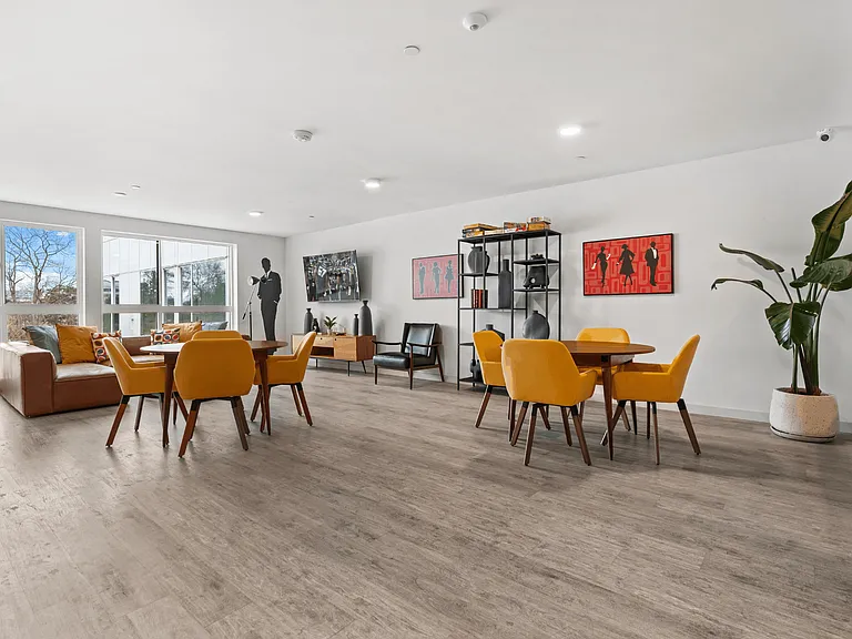 Modern resident lounge with stylish seating and community gathering space.