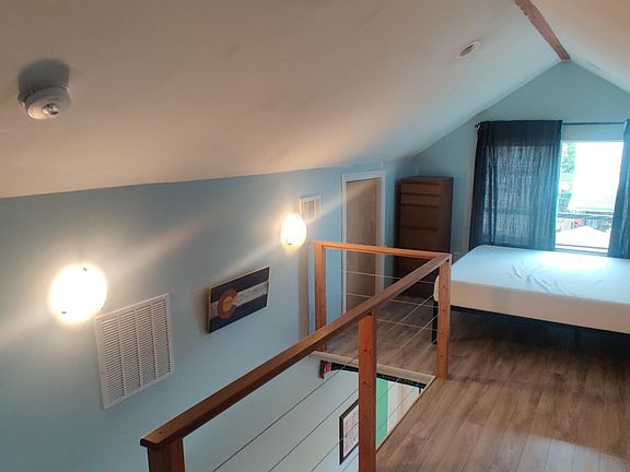Loft bedroom and closet on left side. Full size bed.