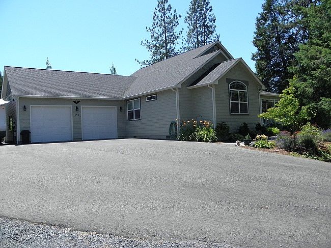 Paved Drive with oversized 2 car garage