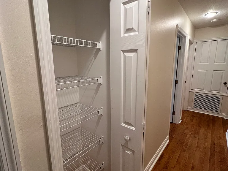 linen closet in hallway
