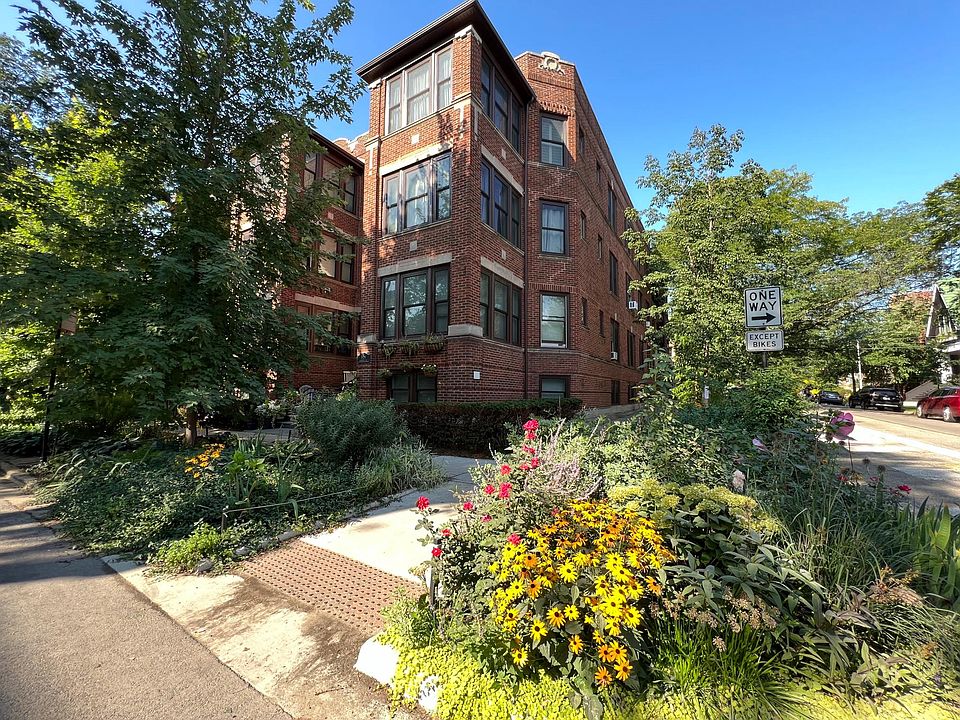 Beautiful gardens in front of building