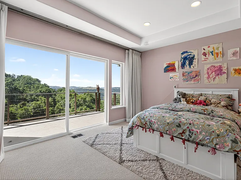 Second bedroom with slider/access to large deck. Location: downstairs