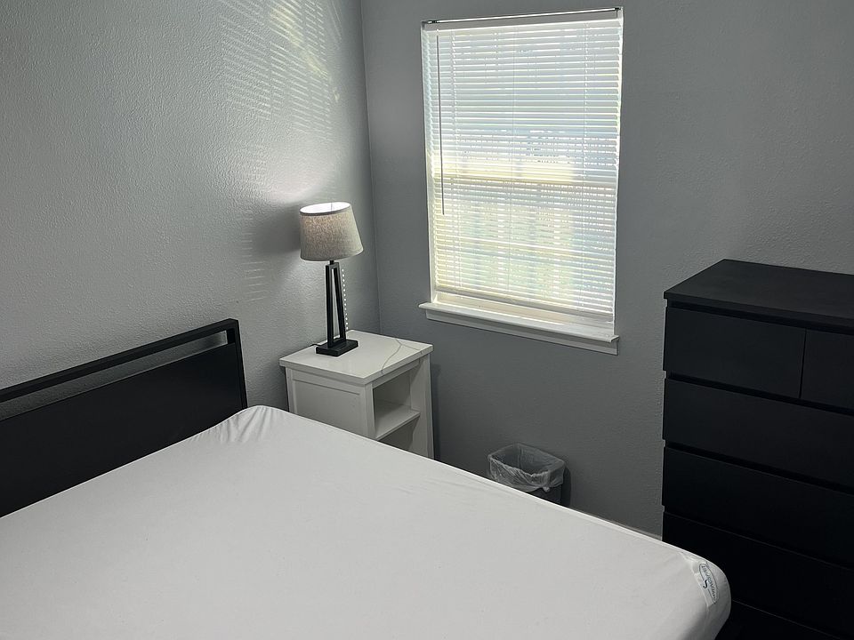 New full size mattress with encasement and mattress cover. Lamp with USB charging port.