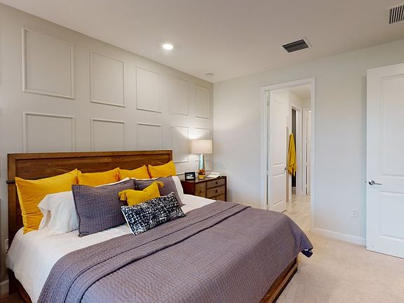 This sophisticated owner s suite enjoys luxurious design details including a spa-like bathroom that