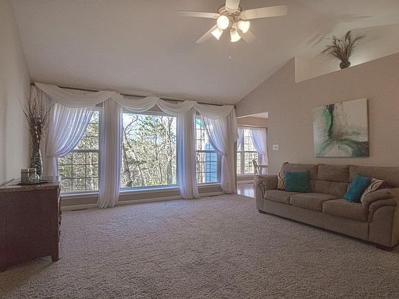 Enter into this bright, spacious living room with great views!