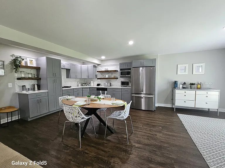 Kitchen is larger than most SFH! Flooring is thick wood look engineered laminate to provide easy clean up.