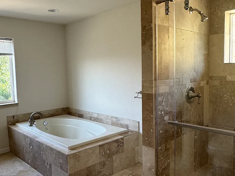 extra large travertine shower in master bath