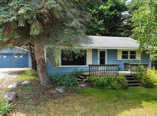 12220 SW Torch Lake Dr, Rapid City, MI 49676