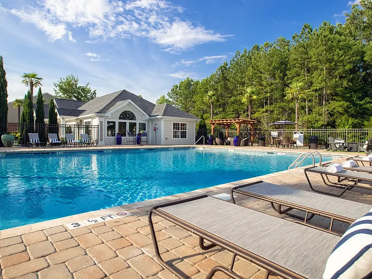Lounge in luxury on our poolside loungers and savor the sun's warm embrace.