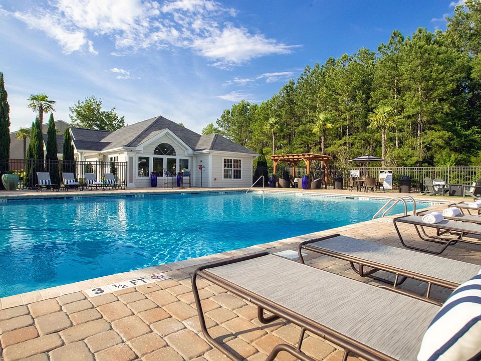 Lounge in luxury on our poolside loungers and savor the sun's warm embrace.