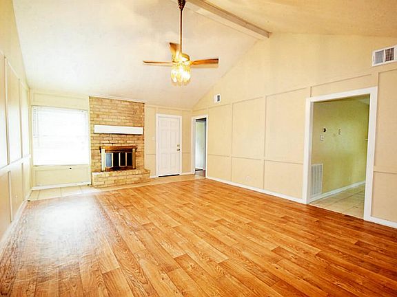 Large living room area with new floors!