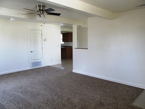 LIVING ROOM GOING TO DINING AND KITCHEN