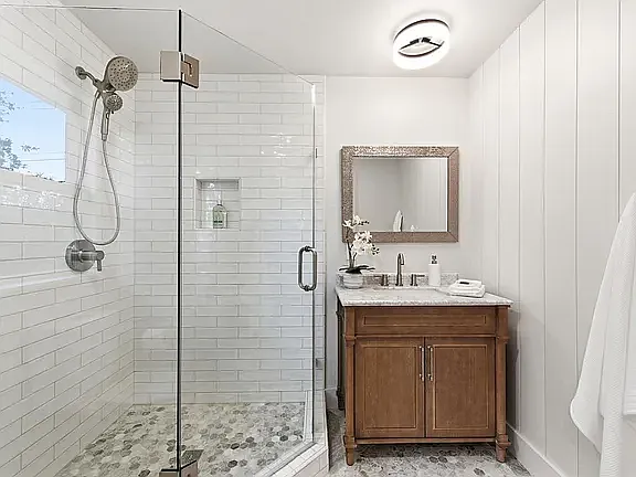 On-suite bath with "hex" marble floors and marble vanity