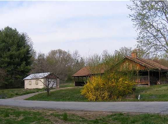 2+ acres are surround this house on both aides of Nelson Road.