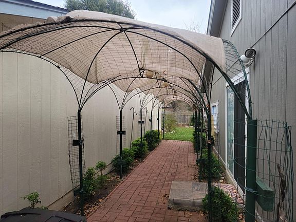 Side patio with pergola