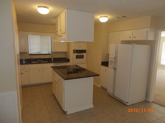 Kitchen with granite counter tops. Refrigerator is not included.