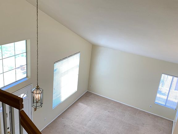 VIEW OF ENTRY WAY & LIVING ROOM